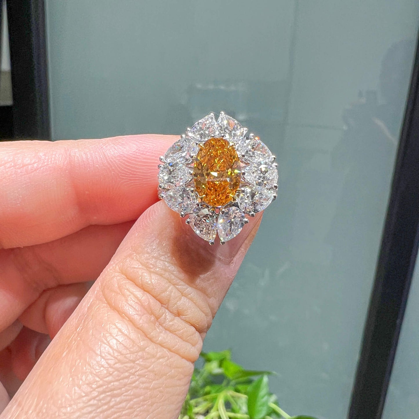 Fancy Vivid Yellow Orange Diamond Ring, 4.78 Ct. TW, Oval shape, GIA Certified