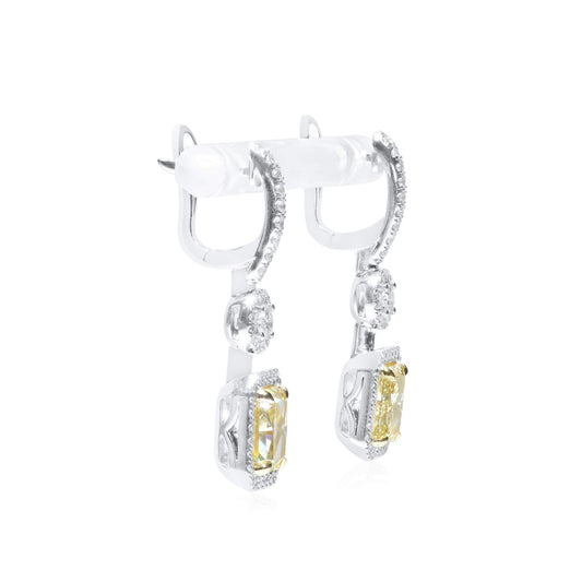 Light Yellow (W-X) Diamond Earrings, 6.04 Ct. TW, Radiant shape, GIA Certified