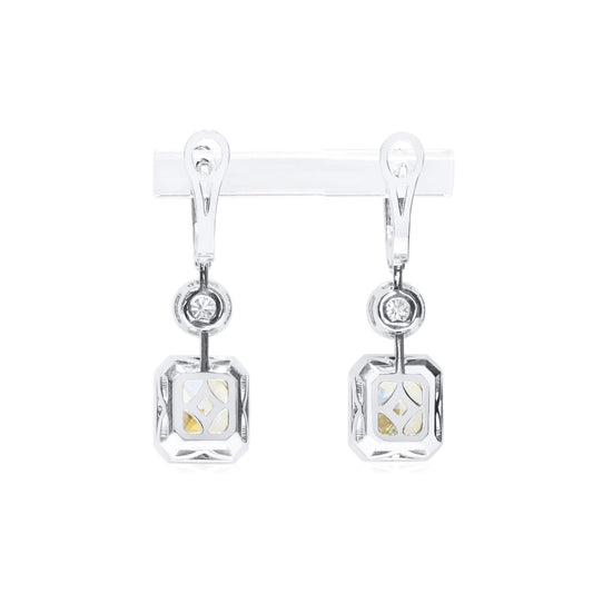 Light Yellow (W-X) Diamond Earrings, 6.04 Ct. TW, Radiant shape, GIA Certified