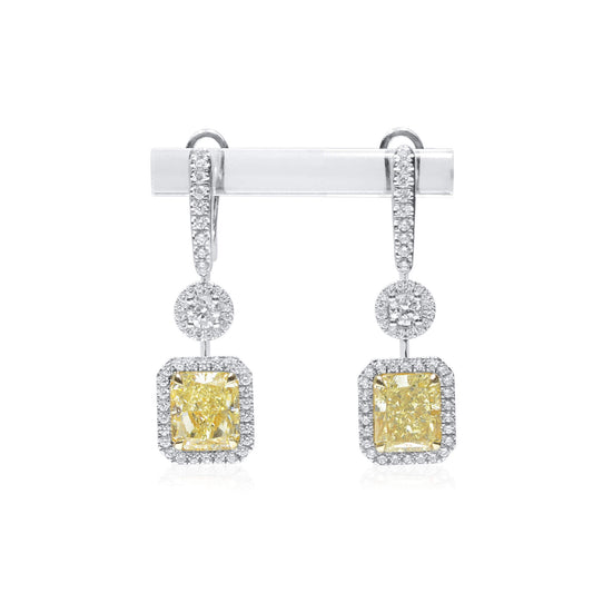 Light Yellow (W-X) Diamond Earrings, 6.04 Ct. TW, Radiant shape, GIA Certified