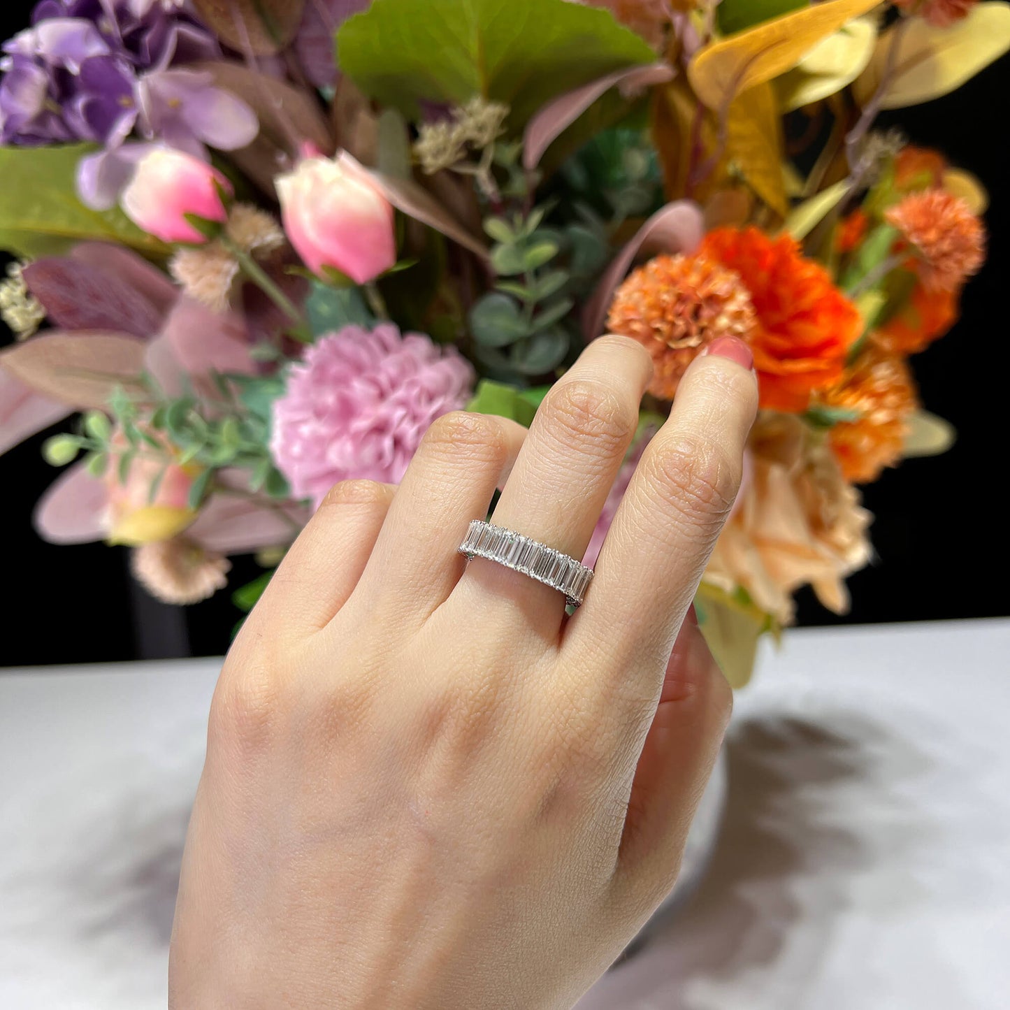 White Diamond and Emerald Eternity Band Ring, 4.87 Ct. (7.75 Ct. TW), Baguette shape