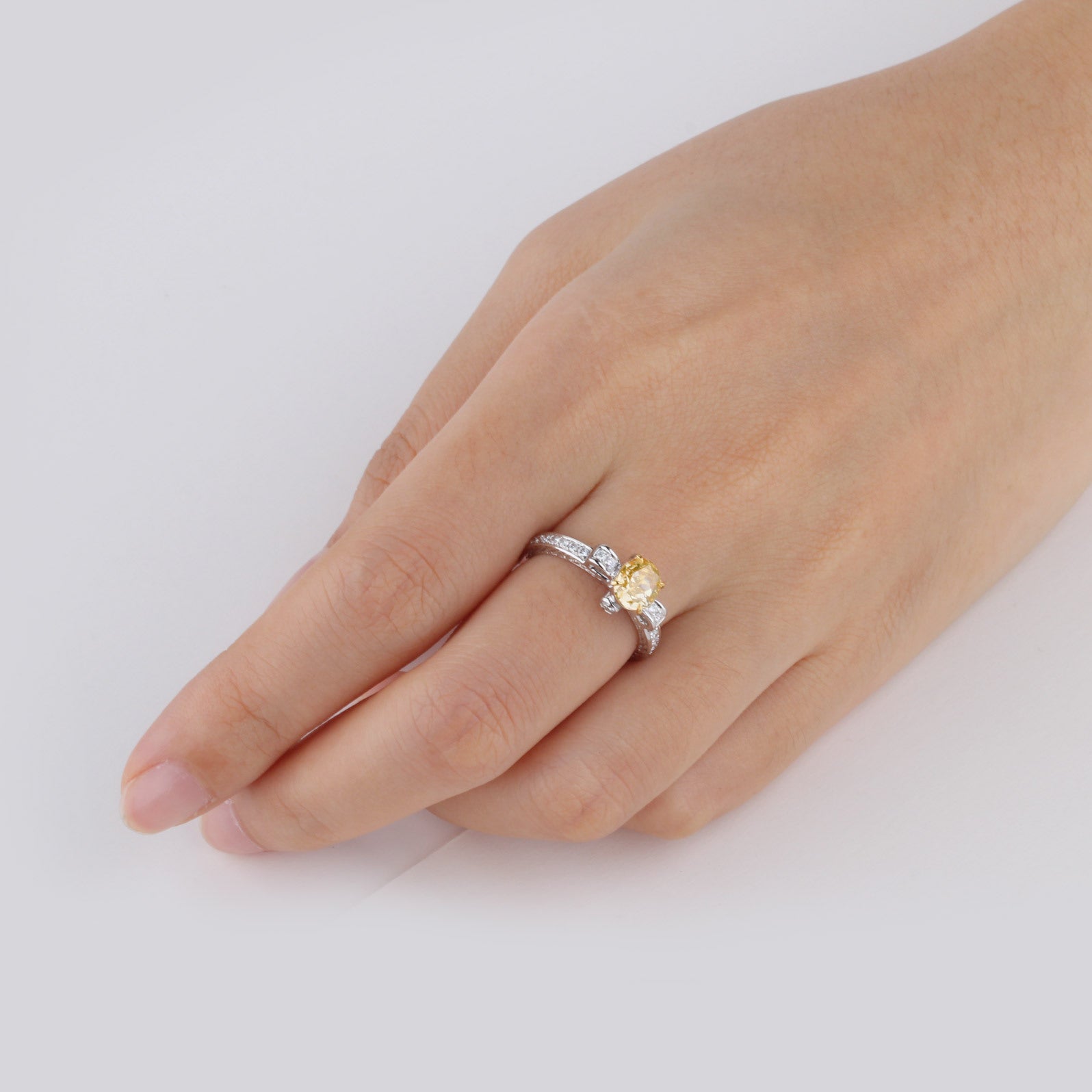 Fancy Intense Yellow Diamond Ring, 1.31 Ct. TW, Oval shape, GIA Certified