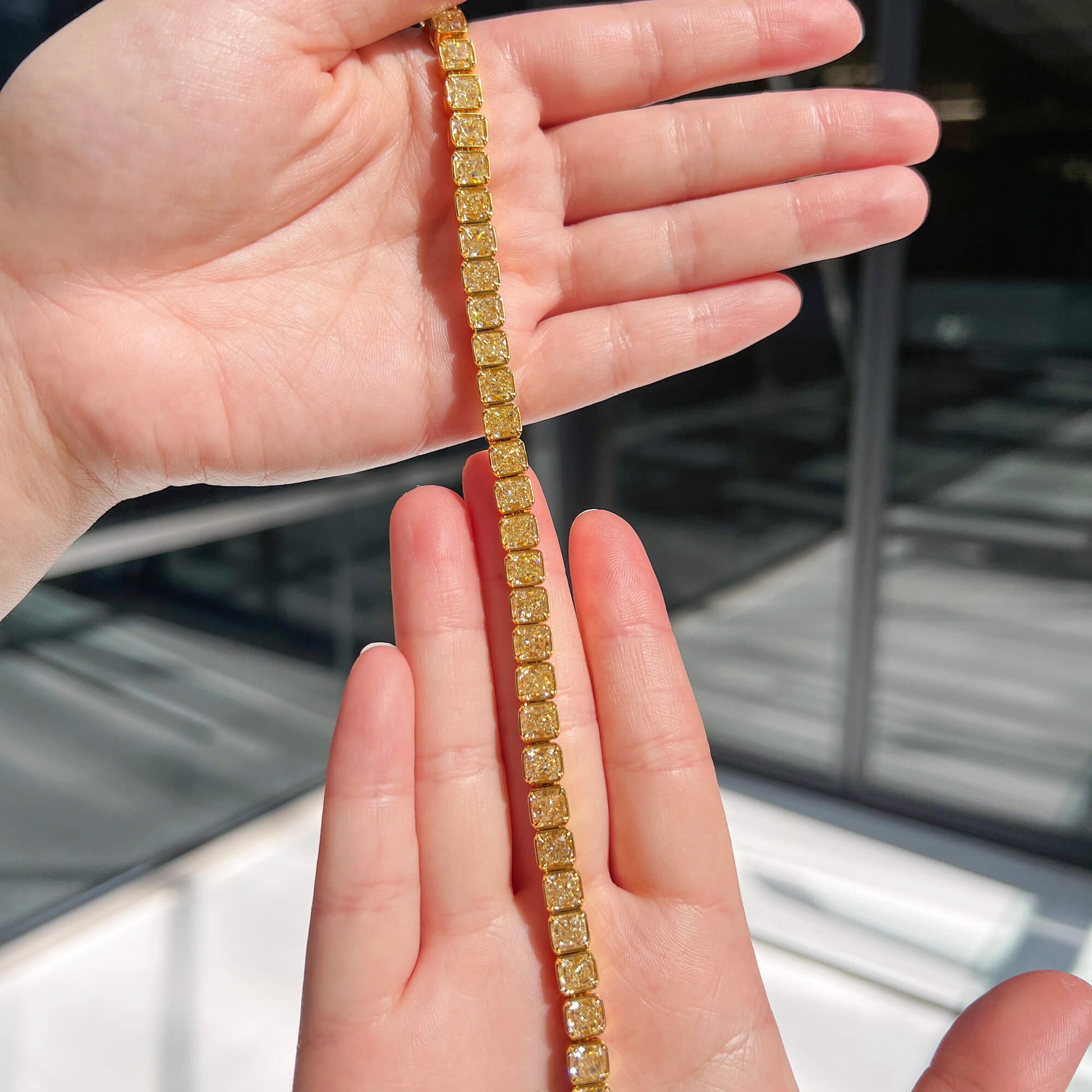 Natural 27.80 Ct. TW Fancy Yellow Radiant-Cut Diamond Tennis Bracelet, 18K Yellow Gold

Notes: total carat weight shown (setting type = Tennis → use total), shape included (Radiant), setting type retained as "Tennis".