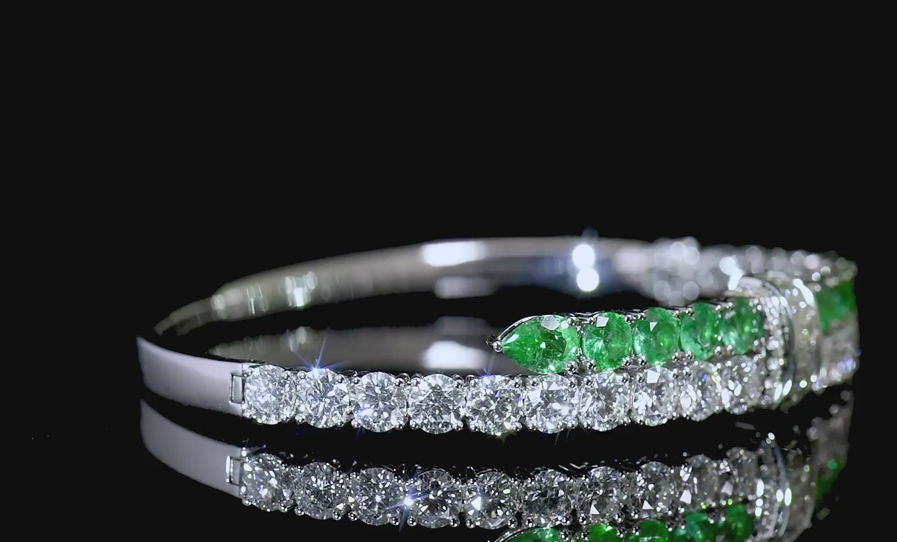 Natural Diamond and Vivid Green Colombian Emerald Bangle, 18K White Gold, 8.03 Ct. TW